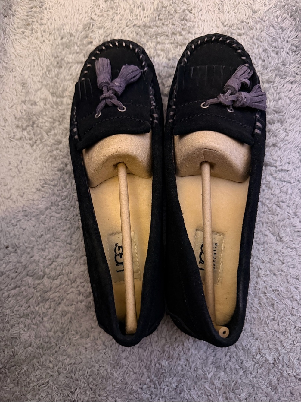 UGG Black Suede Moccasins with Purple Tassel Accents
